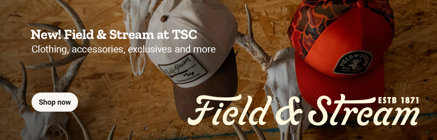 Two Field and Stream baseball caps hanging from skull decor and the text, New! Field and Stream clothing and accessories. TSC exclusives and more.