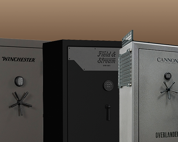 A Winchester, Field and Stream, and Cannon gun safes