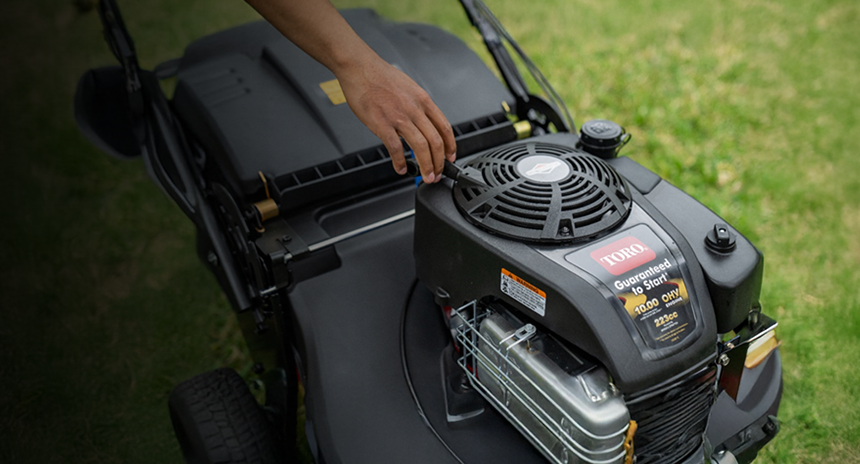 A closeup of a lawn mower with the text, winter mower care. Tips on winterizing lawn mowers. Read more.