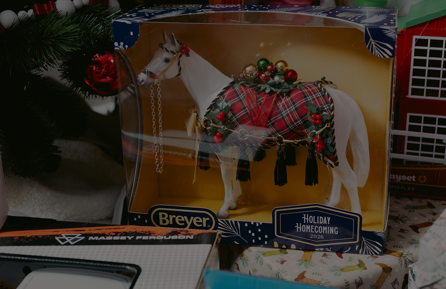 A Breyer horse and accessories are shown. Banner reads, exclusive and limited-edition toys. Wish-list favorites from Breyer. Shop now.