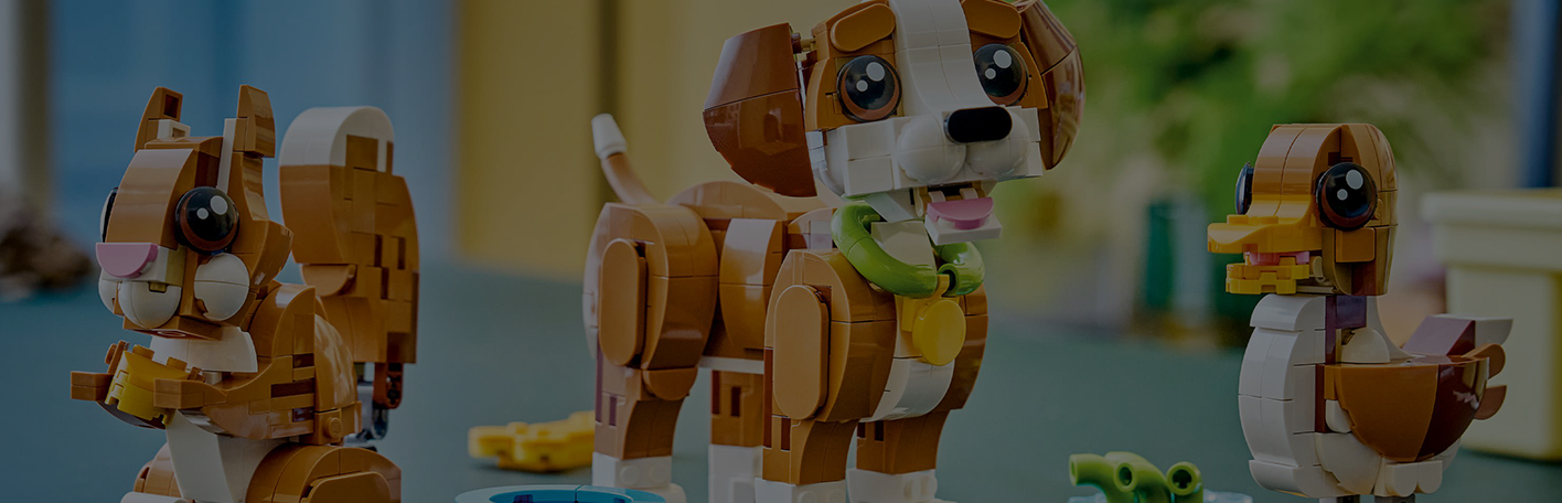 LEGO dog set is shown. Banner reads, new toys, featuring LEGO. The most wonderful gifts of the year are here! Shop now.