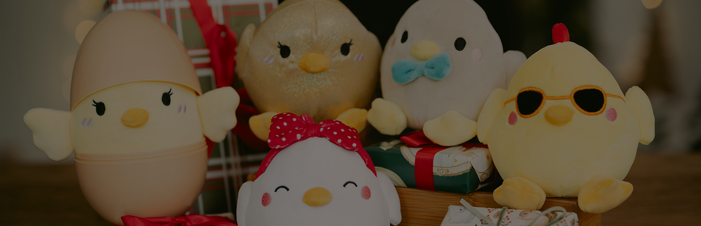 Plush toys are shown. Banner reads, mystery gifts. Surprise them with something unexpected. Shop now.