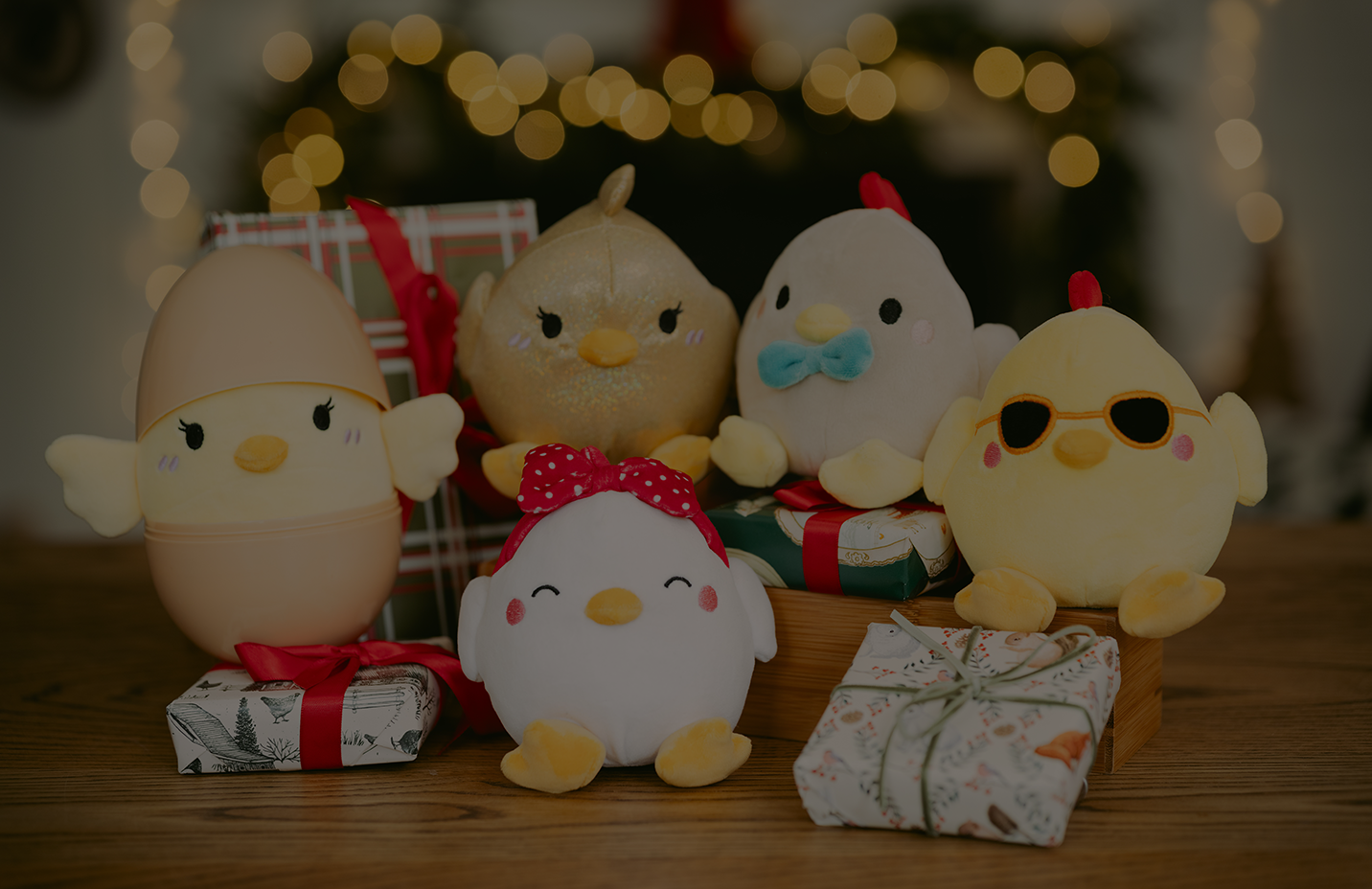 Plush toys are shown. Banner reads, mystery gifts. Surprise them with something unexpected. Shop now.