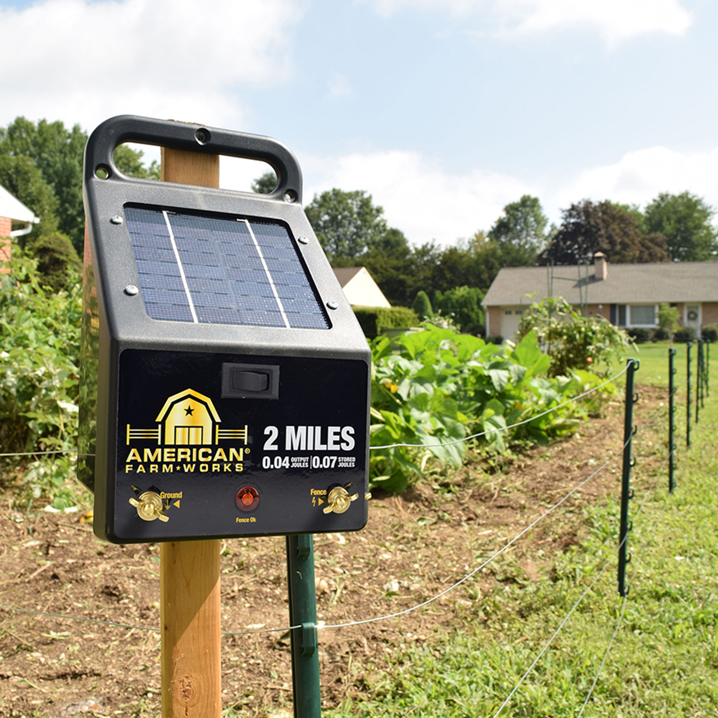 A charger, step in post and wire for fencing is shown.
