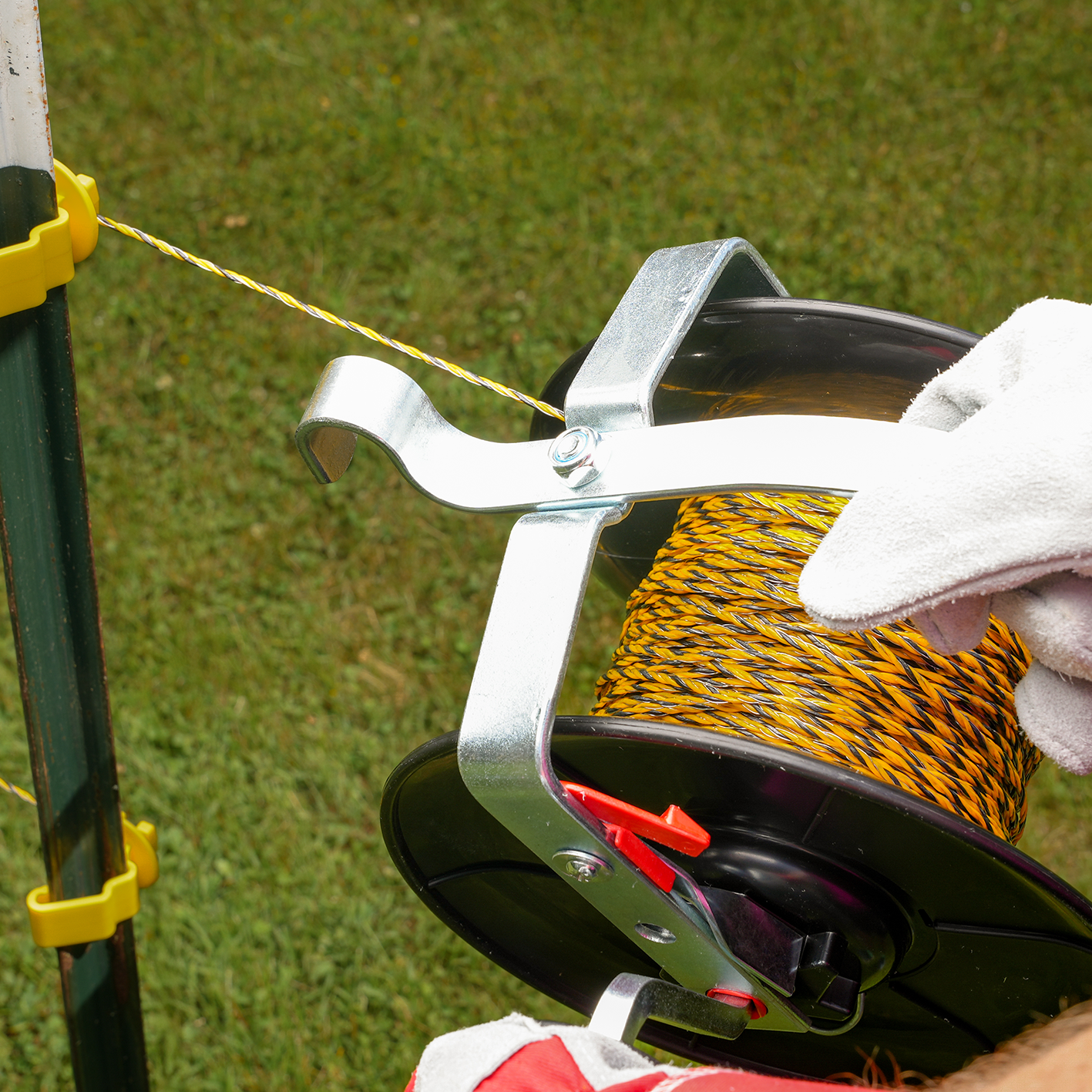 A wire unreeler, polywire, t-post clip and t-posts are shown.