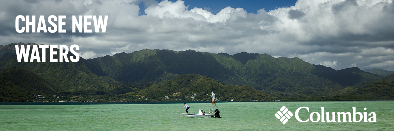 Columbia at Tractor Supply banner reading Chase New Waters, featuring people paddleboarding on a lake with mountains in the background.