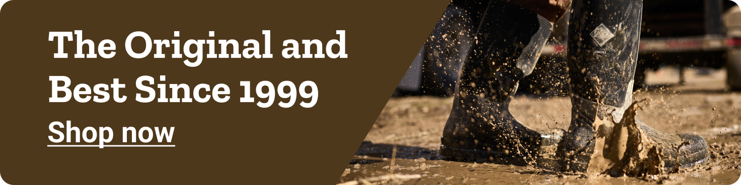 A person wearing Muck Boots. The original and best for work. Shop now. 