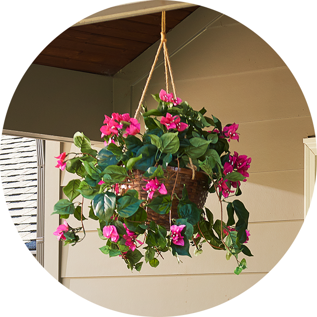 Category tile labeled Pots & Planters, featuring a hanging flower planter. Shop now.