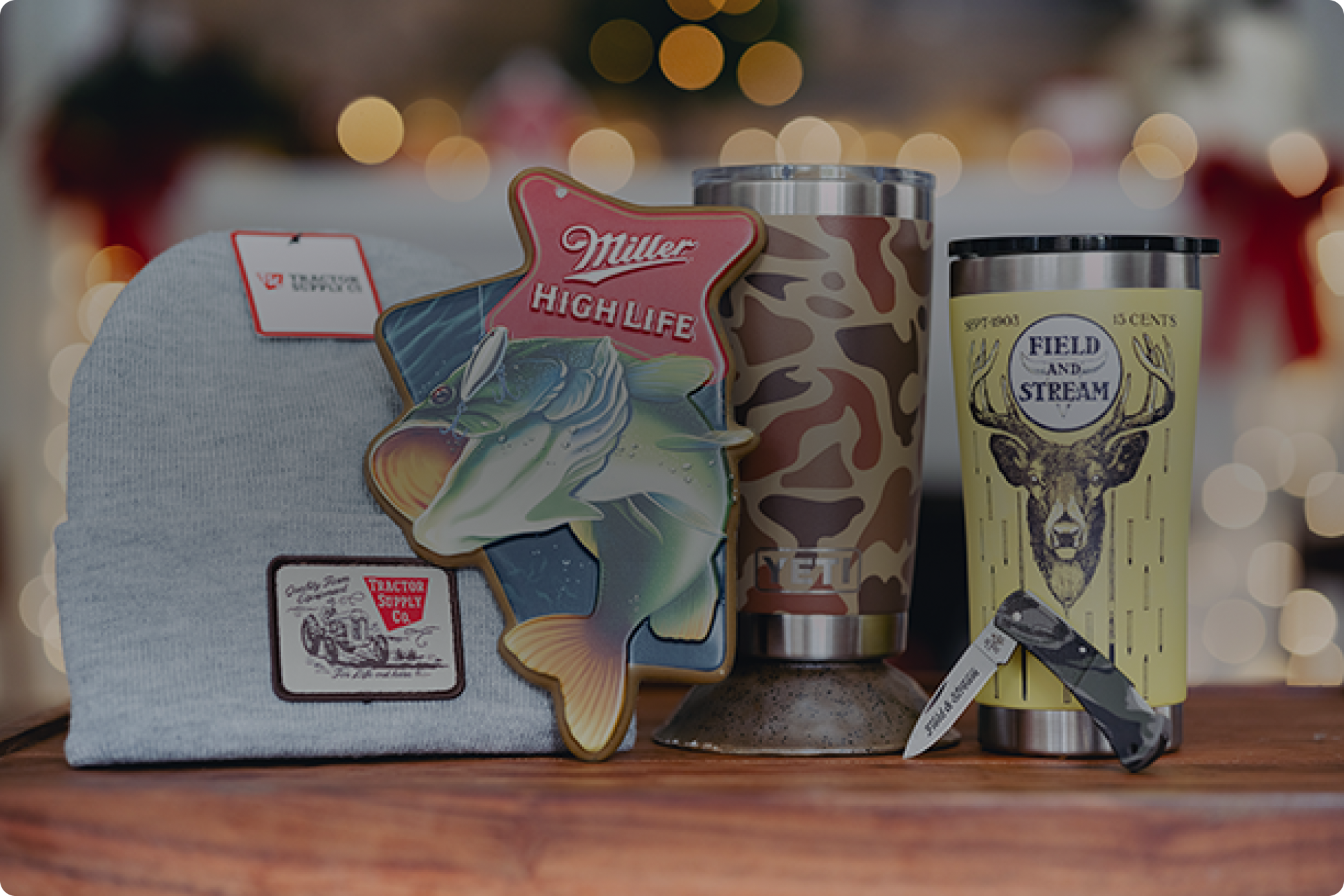 Outdoor gifts including drinkware, knives and accessories are shown. Banner reads, find the best presents for hunting, weekends away and everything in-between. Shop now.