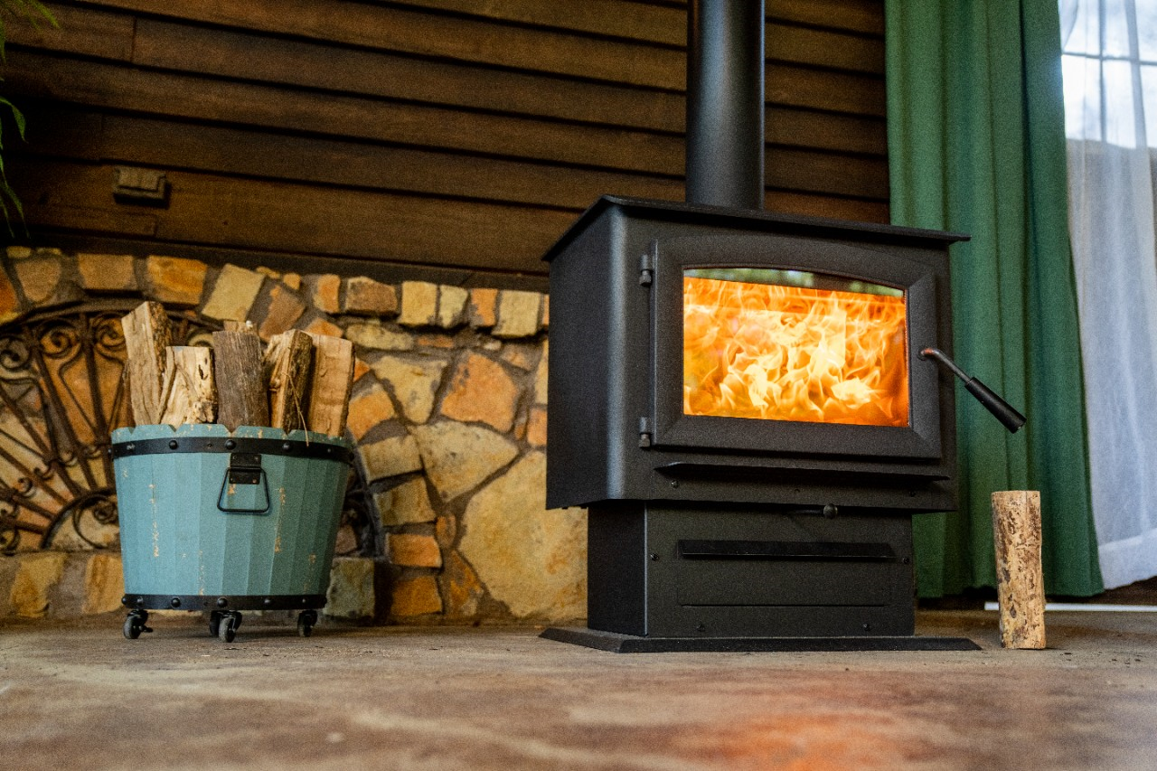 Image of a wood burning stove in a home.