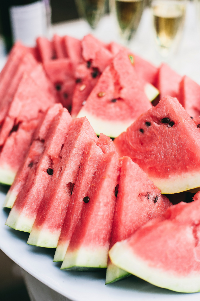 Image of several slices of fresh cut watermelon. 
