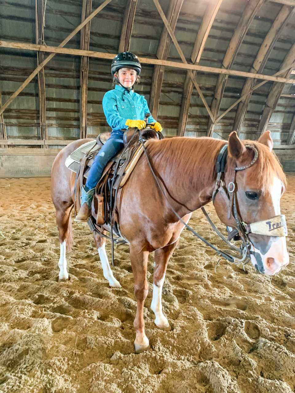 Image of Viviana Mings at her first riding lesson.